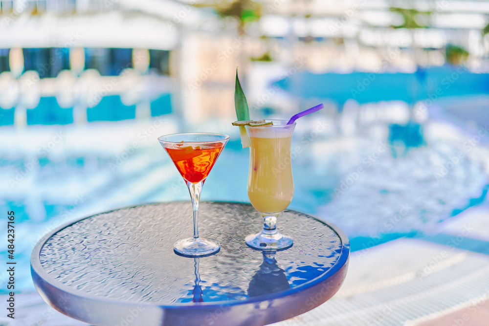 Relaxing vacations with refreshing cocktails by the pool at the all-inclusive resort